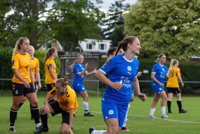 Evie Driscoll-King celebrates a goal for Posh v Cambridge. Photo: Ruby Red Photography