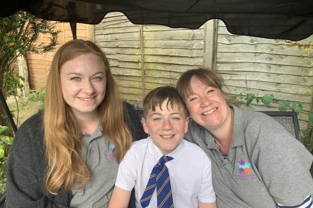 Amy Fisher, with son, Jack, who was born profoundly deaf, and daughter, Poppy, who is on the Peterborough and District Deaf Children’s Society's "amazing" committee.