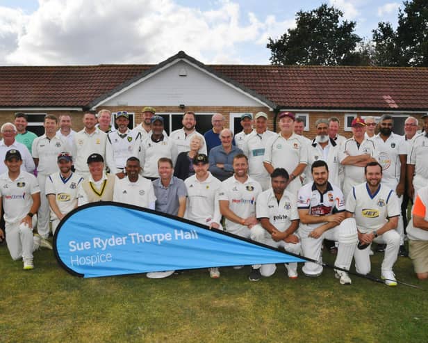 Teams and officials at the memorial cricket match for John Bigham at Orton Park CC. Photo: David Lowndes.