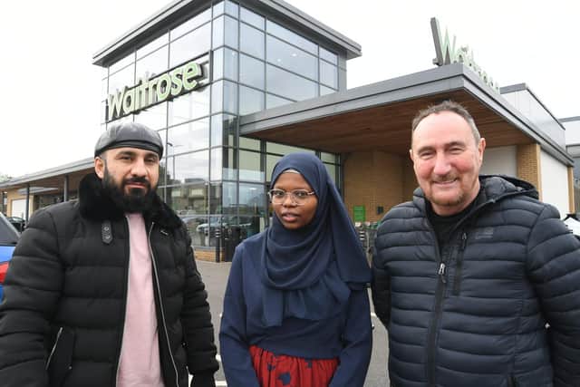 Donald MacLarty from the Peterborough Asylum and Refugee Community Association (PARCA) has launched an employment scheme which helps refugees like Faisal Mokhammad Aiup (L) and Moneera Taher find work with local businesses.