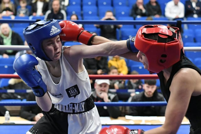 PPBC boxer (blue)  Hannah'may Anderson v Kylie Stone-Parker during a Peterborough Police Boxing Tournament at Queen Katharine Academy.