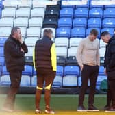 Darren Ferguson and Dean Holden inspect the pitch before the match was called off: Photo: Joe Dent.