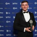 Harrison Burrows with EFL League One Player-of-the-Year award. Photo Andrew Fosker/Shutterstock.
