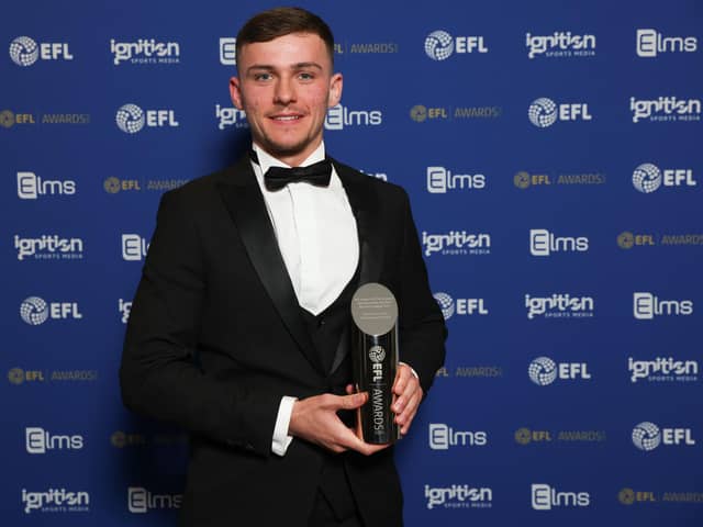 Harrison Burrows with EFL League One Player-of-the-Year award. Photo Andrew Fosker/Shutterstock.