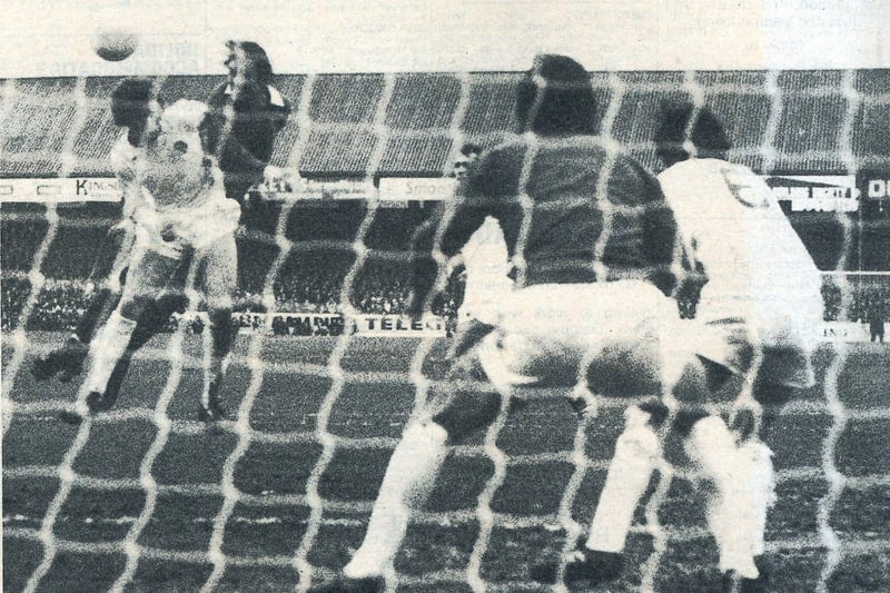 John Cozens heads home the Posh consolation goal in the 1974 FA cup tie in front of a capacity crowd of 28,000. Photo: National World