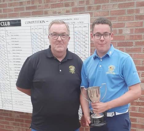 Milton Junior Championships winner Jacob Williams (right) with club captain Pete Horsted.