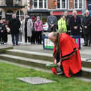 Mayor Nick Sandford lays a wreath on behalf of the city to mark Holocaust Memorial Day at St John's Church.