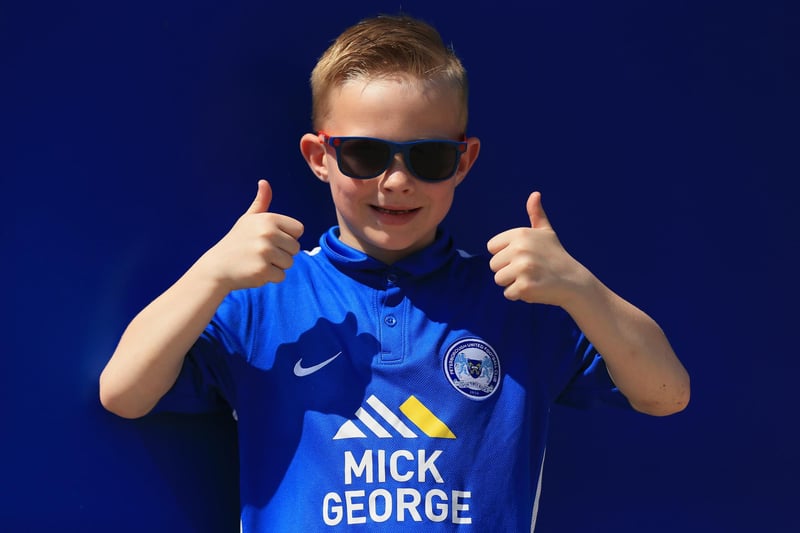 A young Peterborough United fan shows his support prior to the Sky Bet League One match between Peterborough United and Blackpool at ABAX Stadium on May 8, 2016.