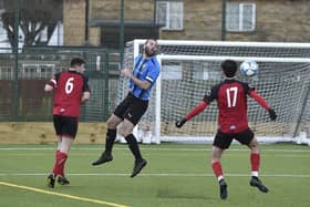 Cardea FC (blue) in action earlier this season. Photo David Lowndes.