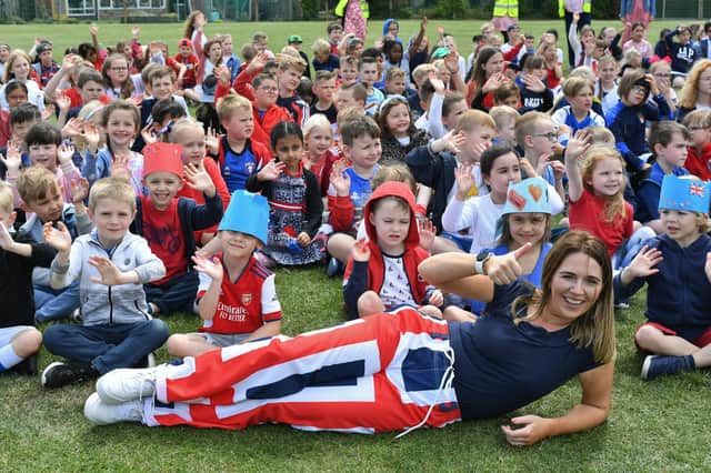  Jubilee celebrations at Werrington primary school -  year 2 teacher Andrea Corner with some of the pupils