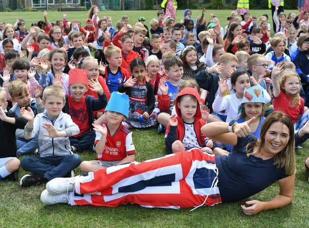  Jubilee celebrations at Werrington primary school -  year 2 teacher Andrea Corner with some of the pupils