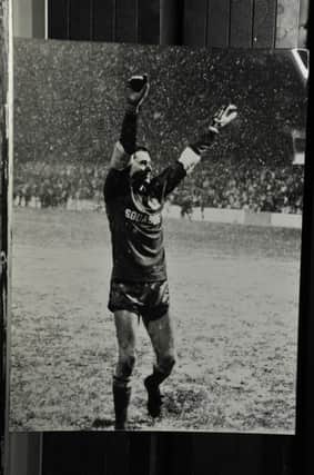 Stand0in Posh goalkeeper Martin Pike celebrates a famous FA Cup win against Leeds United. Photo: David Lowndes.