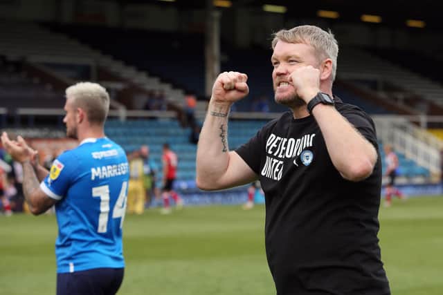 Peterborough United manager Grant McCann celebrates beating Lincoln at full-time. Photo: Joe Dent.