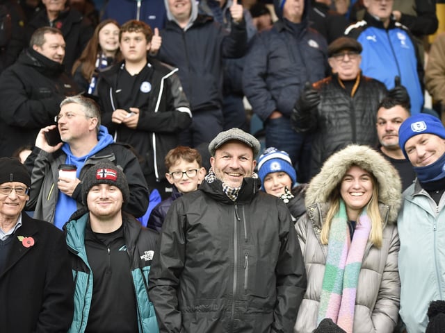 Peterborough United fans watch their side struggle to a 2-2 draw at home to Salford.