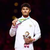 Gunthorpe's Jake Jarman proudly shows off his third Gold medal of the 2022 Commonwealth Games. Photo: Elsa/Getty Images).