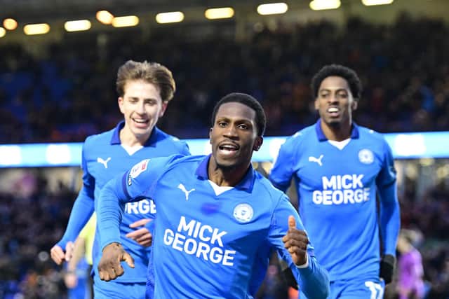 Pemi Aderoju celebrates his goal for Posh v Wigan. Photo David Lowndes.