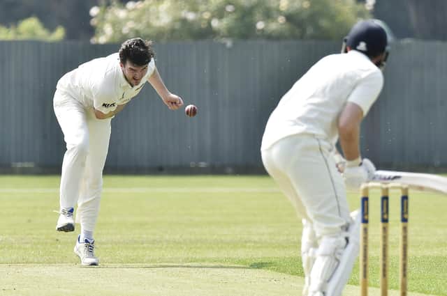 Captain Nick Green bowling for Peterborough Town against Finedon. Photo David Lowndes.