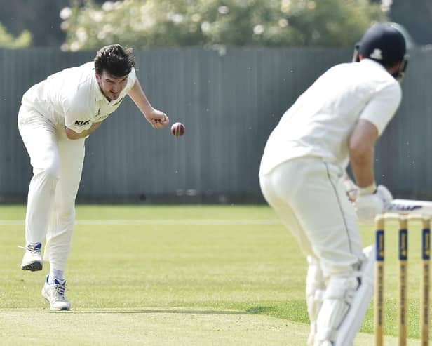 Captain Nick Green bowling for Peterborough Town against Finedon. Photo David Lowndes.