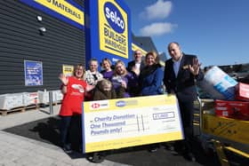 Little Miracles CEO Michelle King (centre) with Selco Peterborough branch manager Chris Barber (far right) and other representatives of Little Miracles and Selco.