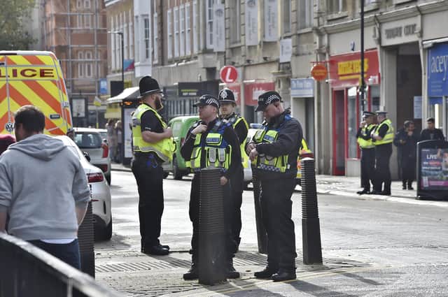Police in Peterborough city centre before the derby match in October.