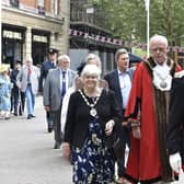 Mayor of Peterborough Nick Sandford with Mayoress Bella Saltmarsh take part in the  procession from the Town Hall
