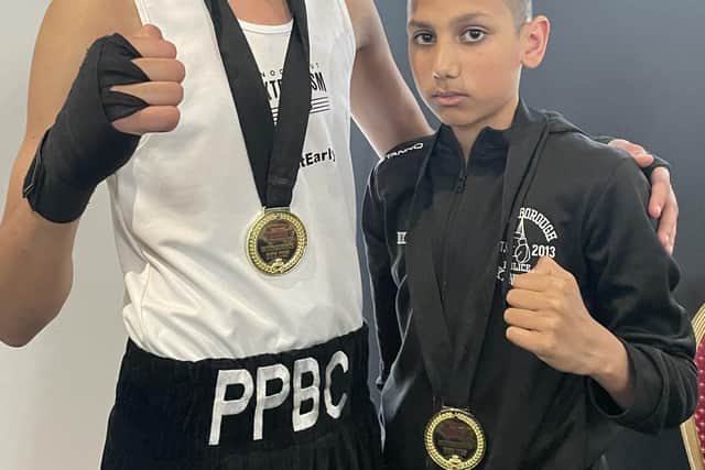 Gold medal winning brothers Muhammad Ismaael (left) and Musa Ahmed.