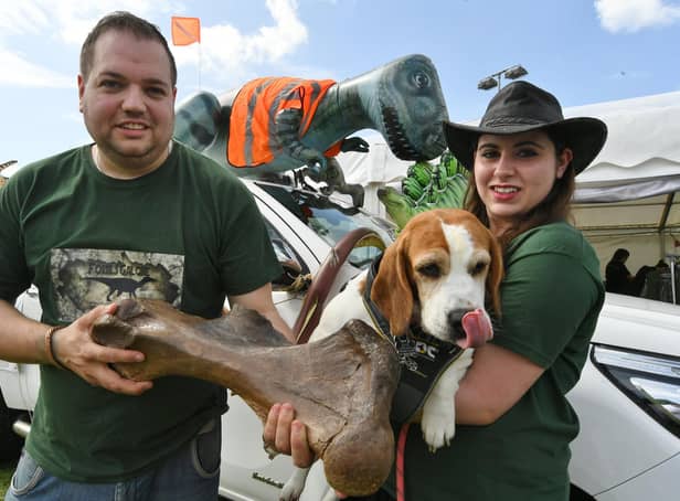 Fossils Galore founder Jamie Jordan and partner Sarah Moore with Crystal the fossil-sniffing beagle at the Yaxley Festival.