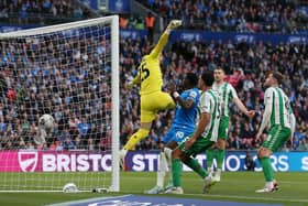 The ball has flown over the head of Wycombe Wanderers goalkeeper Franco Ravizzoli to give Posh another Wembley win. Photo Joe Dent/theposh.com