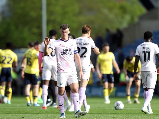 Harrison Burrows acknowledges the Posh fans after a the 5-0 hammering at Oxford United. Photo Joe Dent/theposh.com