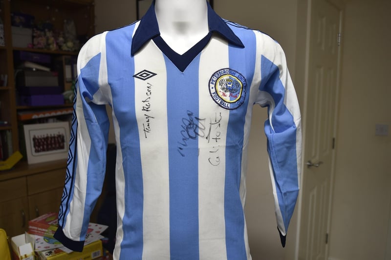 A look inspired by Argentina - and there might be a few clues with the autographs - but when did Posh play using this kit?