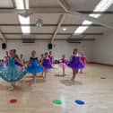 Students of Tu Danse Academy rehearse for the CPSO Spring concert 'Rhythm & Dance'