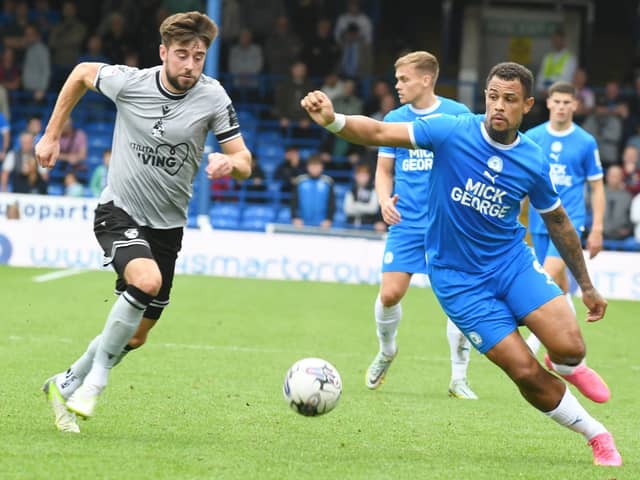 Jonson Clarke-Harris (right) in action for Posh against Bristol Rovers earlier this season. Photo: David Lowndes.