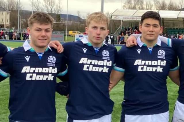 Logan Noble (middle)