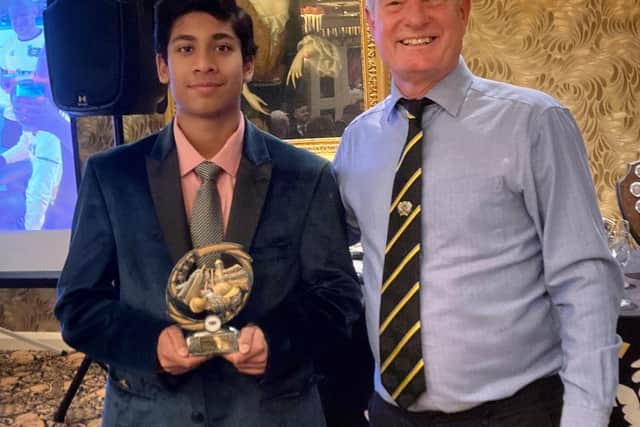 Peterborough Town CC chairman Brian Howard (right) with Sunday 2nd XI player of the year Shiven Singal.