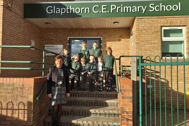 Glapthorn C of E Primary Headteacher, Mrs Coulthard with pupils 
