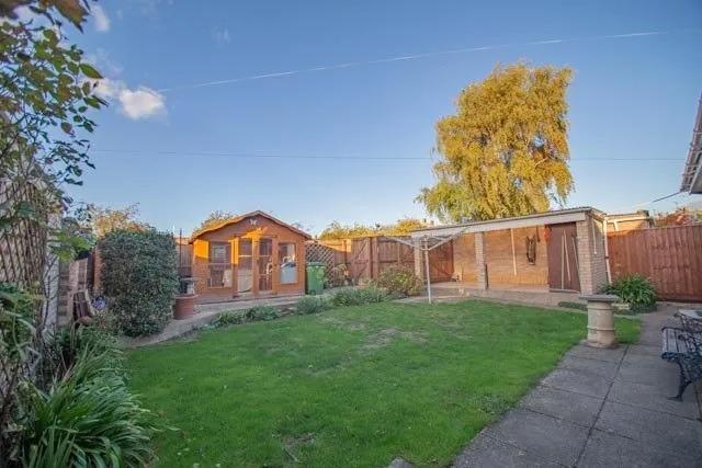 The property has a garden to the front and rear and a car port