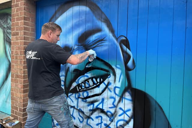 Nathan Murdoch painting British rapper Dave