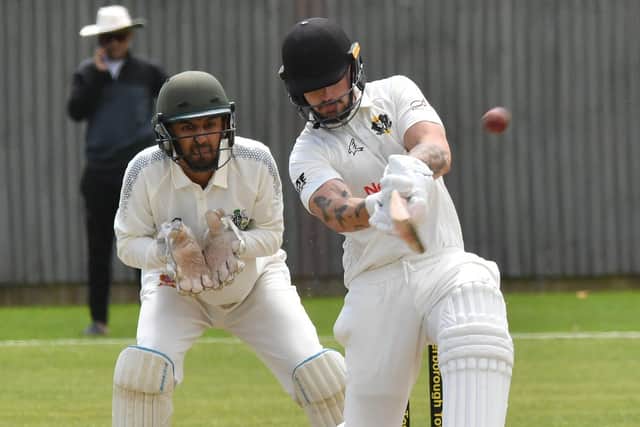 Chris Milner hits out during an innings of 47 for Peterborough Town against Wanstead. Photo David Lowndes.
