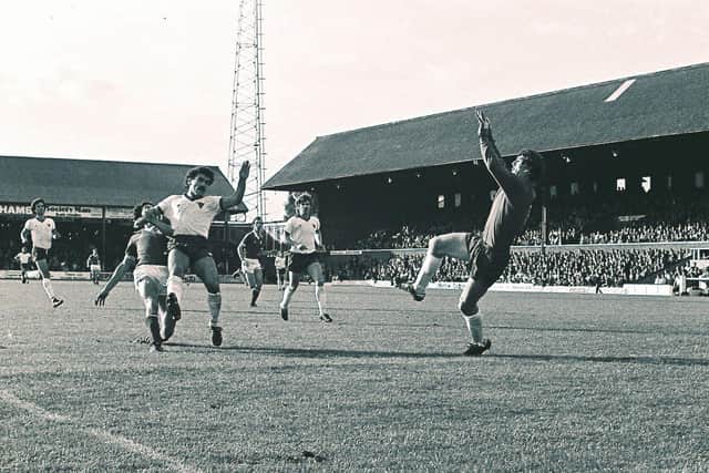 Action from Posh v Bury in 1980