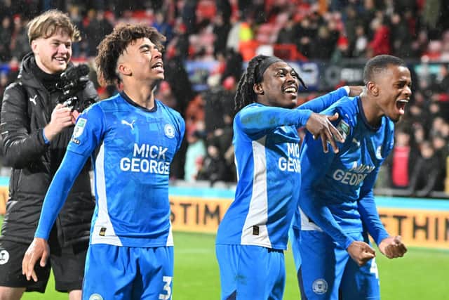 From the left James Dornelly, Abraham Odoh and Brad Ihionvien celebrate the win at Wrexham. Photo David Lowndes.