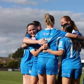 Posh Women celebrate a goal against Huddersfield Town. Photo Darren Wiles