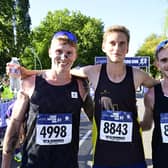 Great Eastern Run 2026 winner Julian Moynham with Josh Holby (2nd, left) and Amitti Ben-Israel (3rd)