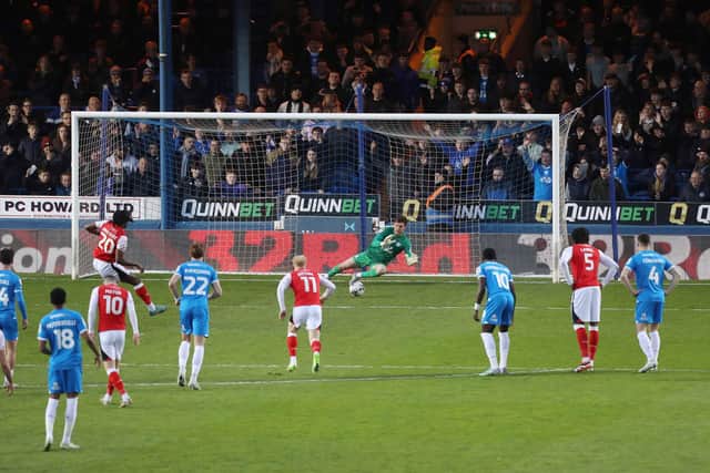 Posh goalkeeper Jed Steer saves a first-half penalty against Fleetwood. Photo David Lowndes.