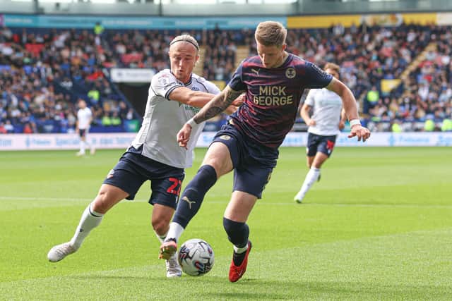 Action from Bolton v Posh earlier this season. The match finished 1-1. Photo: Paul Currie/Shutterstock