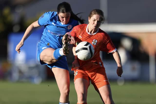 Jess Stanford in action for Posh Women (blue) v Boldmere St Michael. Photo Darren Wiles.