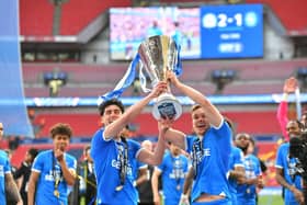 Archie Collins (right) with great mate Joel Randall after Posh won the EFL Trophy Final at Wembley in 2024. Photo David Lowndes.