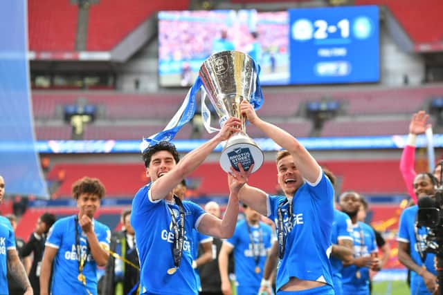 Archie Collins (right) with great mate Joel Randall after Posh won the EFL Trophy Final at Wembley in 2024. Photo David Lowndes.