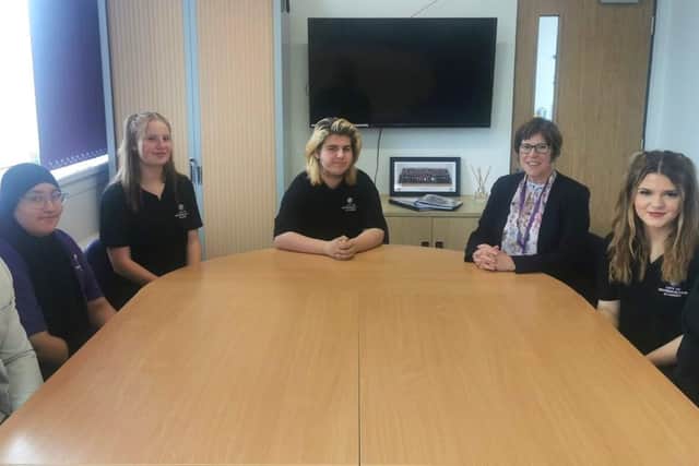 Staff and pupils at City of Peterborough Academy