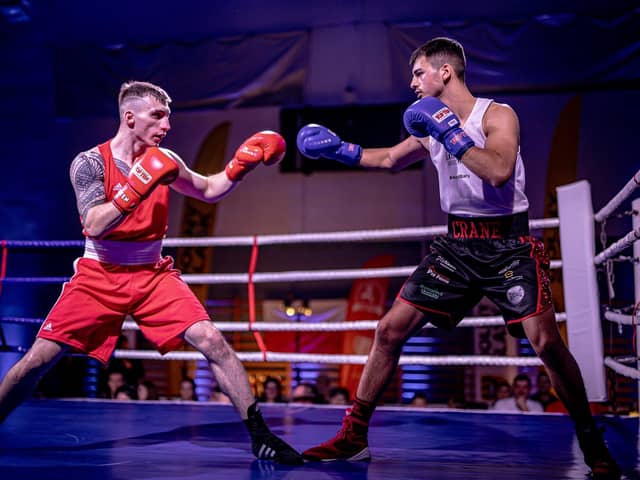 City boxer Charlie Crane (right) in action in Poland.