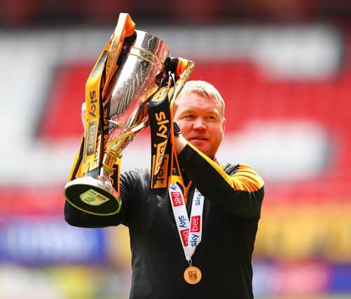 Posh boss Grant McCann celebrates clinching the League One title at Charlton when he was manager of Hull in May, 2021. Photo:Jacques Feeney/Getty Images.